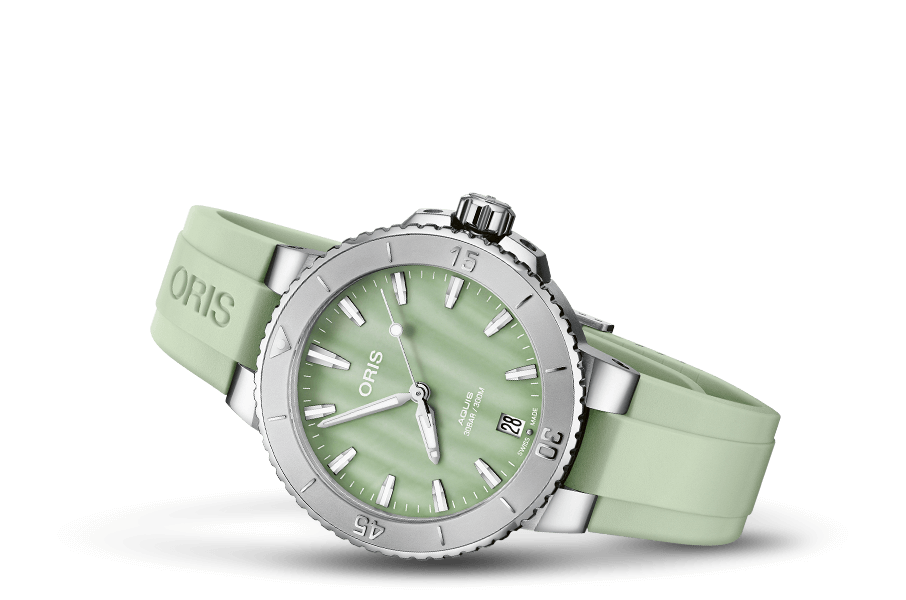 Oris Dameshorloge 36,5 mm met lichtgroene wijzerplaat en siliconen band. Stijlvolle tijdwaarneming met Zwitserse precisie voor moderne vrouwen.